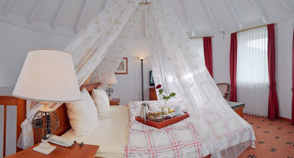 Zimmer Beerenauslese mit Frühstück im Himmelbett